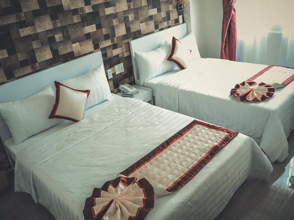 Minh Hoang Hy Hotel Da Nang Værelse billede